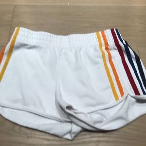 white shorts with rainbow on side
